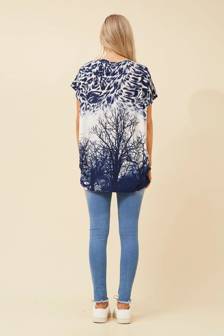 EXCELINA ANIMAL PRINT TOP