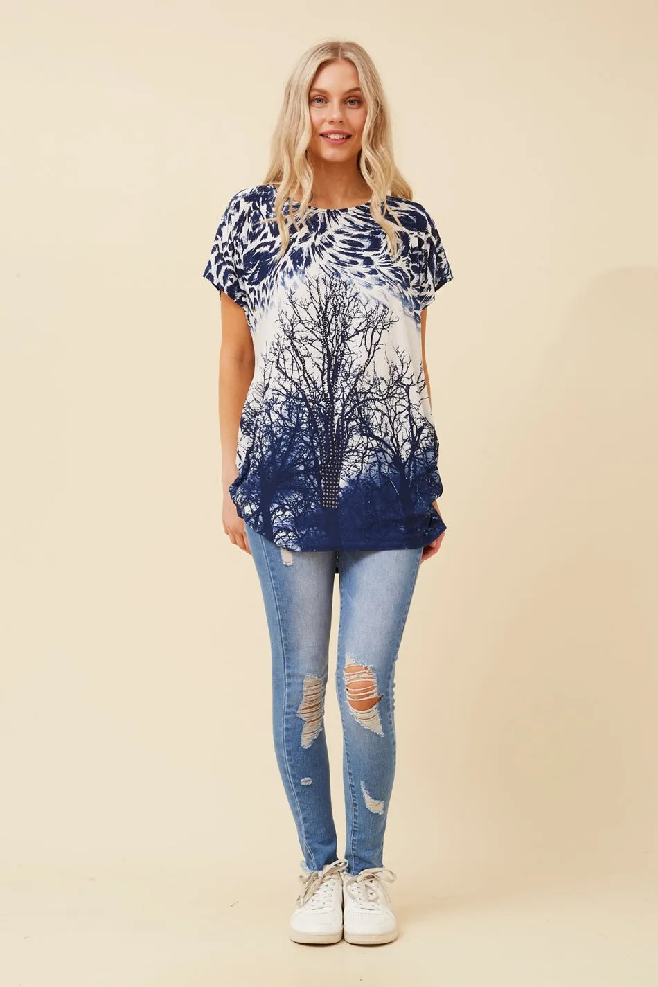 EXCELINA ANIMAL PRINT TOP