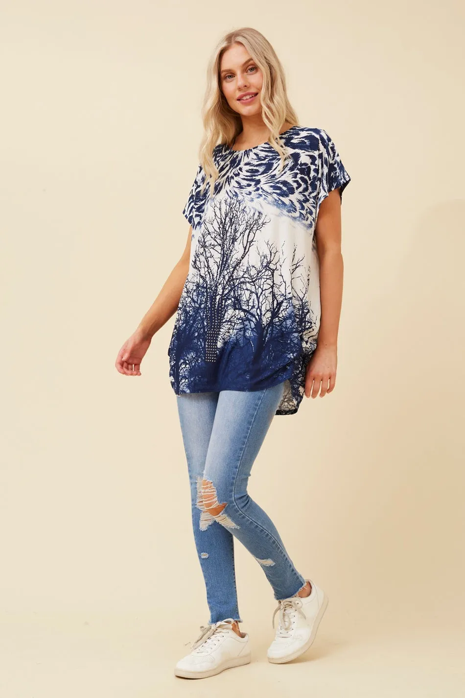 EXCELINA ANIMAL PRINT TOP